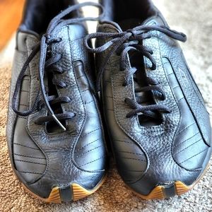 Mens Diesel black lace up sneakers.